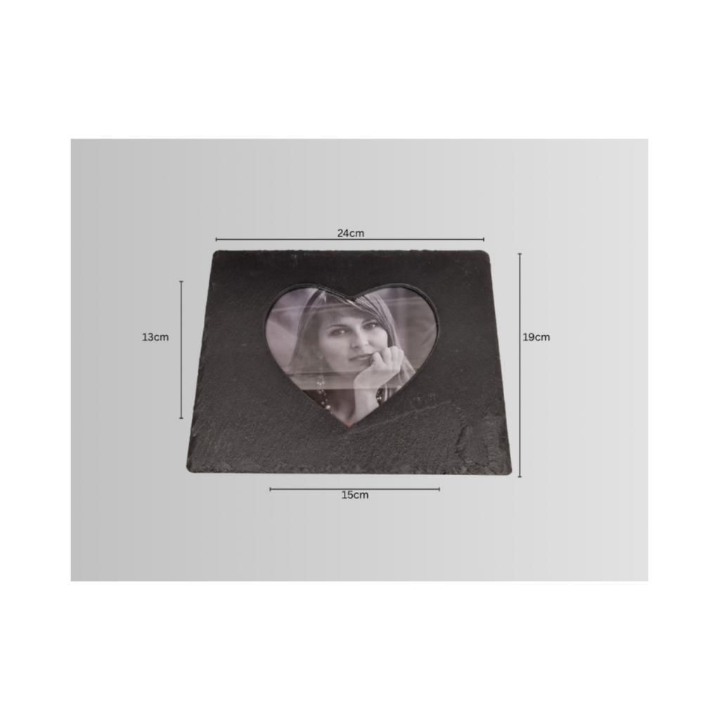 A square black slate photo frame with a heart-shaped cutout in the center, showning  dimension lines indicating 24cm width and 19cm height.