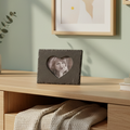 A dark gray slate heart-shaped picture frame with a cutout photo in the center.