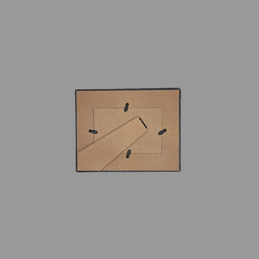 The back of a square picture frame, showing the diagonal support bar.