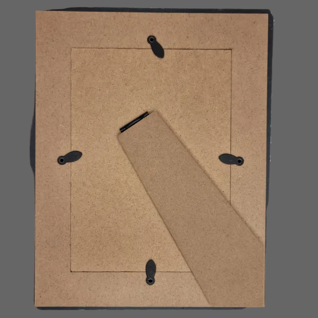 The back view of a rectangle picture frame.