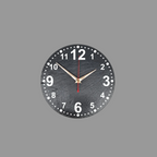 A round black wall clock with numerals, white dot hour markers, gold-tone hands, and a red second hand, shown against a light gray background.