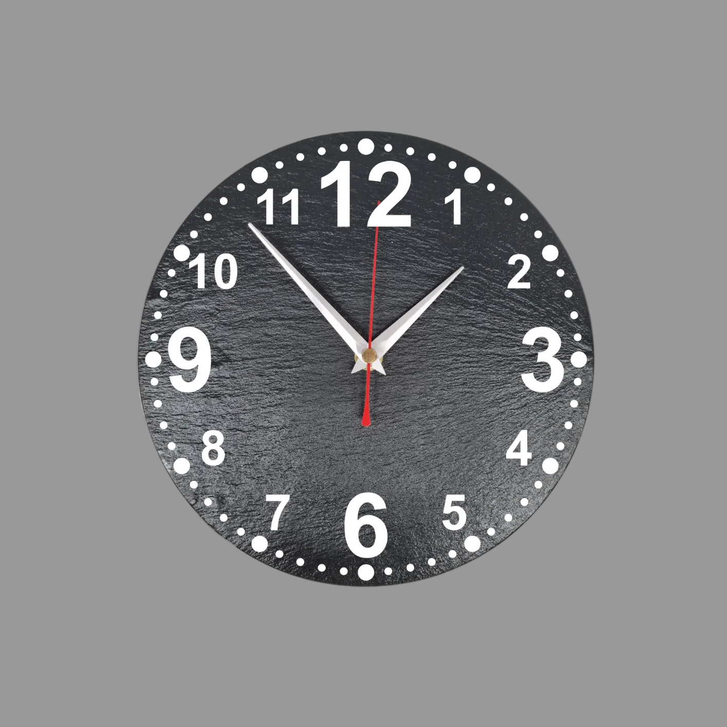 A round black slate wall clock with numerals, silver hands, and a red second hand, shown against a solid gray background.